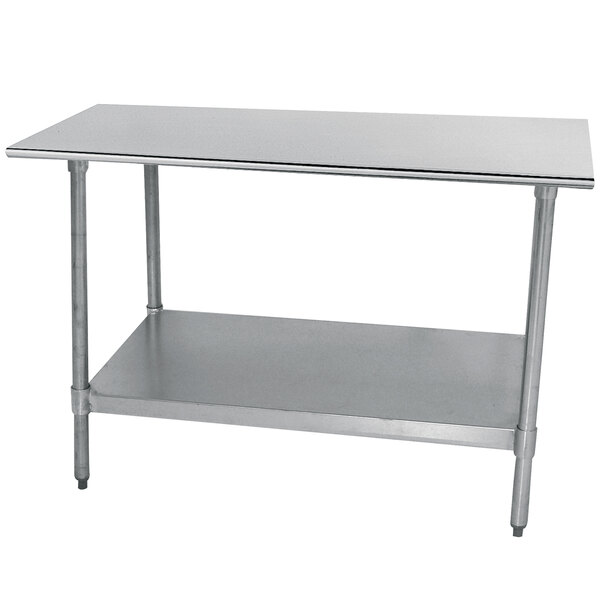 An Advance Tabco stainless steel work table with a shelf.