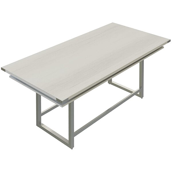 A Safco Mirella rectangular standing conference table with white ash top and metal legs.