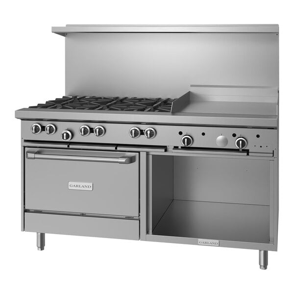 A large stainless steel Garland commercial gas range with 6 burners, a griddle, and storage.