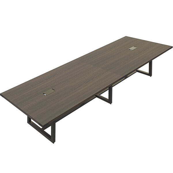 A Safco Mirella rectangular conference table in Southern Tobacco finish with two legs.