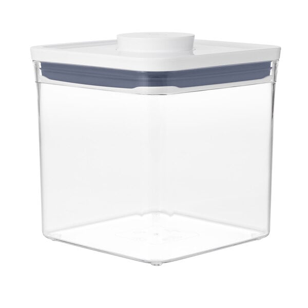 An OXO Good Grips clear plastic food storage container with a white lid.