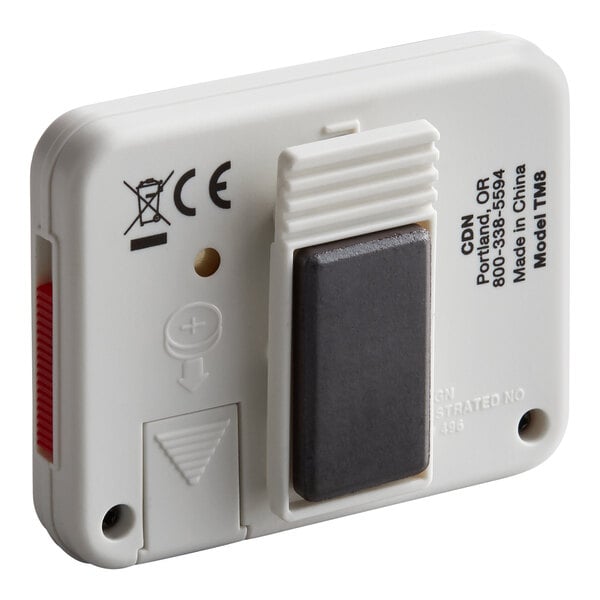 A white digital kitchen timer with a clip and magnet on the back.
