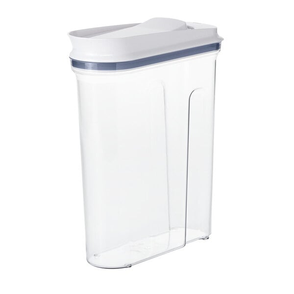 An OXO clear plastic food storage container with a white lid.