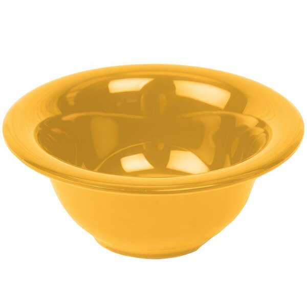 A yellow Thunder Group melamine soup bowl on a white background.