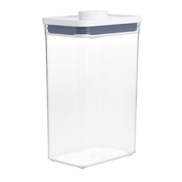 An OXO clear plastic rectangular food storage container with a white lid.