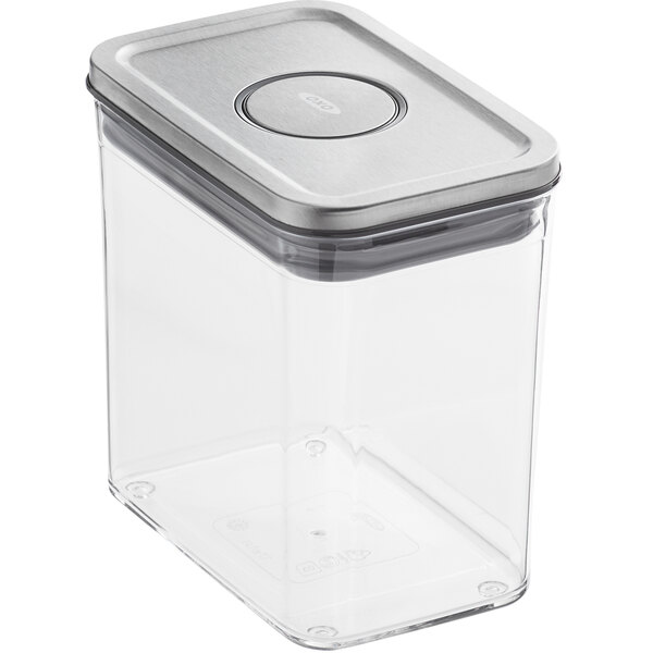 An OXO clear plastic rectangular food storage container with a stainless steel lid.
