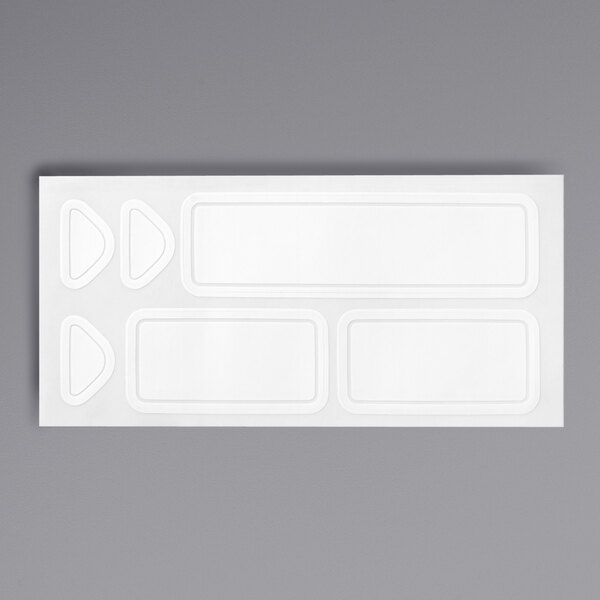 A white rectangular OXO Good Grips POP label with a black border and three different shapes inside.