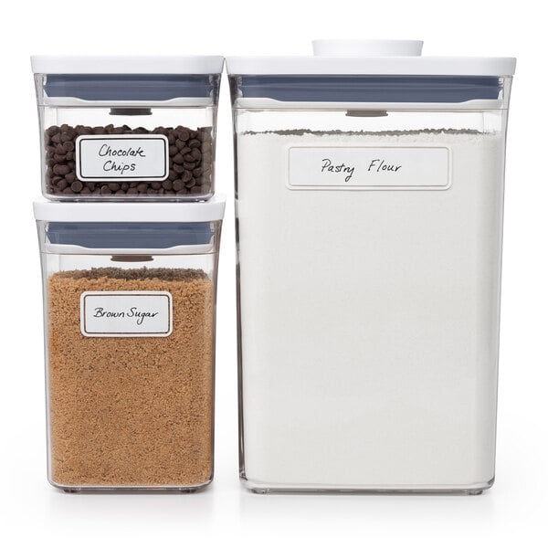 OXO Good Grips POP Removable Labels on containers of brown sugar, white flour, and spices.