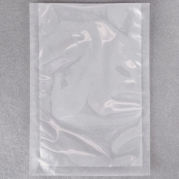 A clear plastic bag filled with ARY VacMaster vacuum packaging pouches.