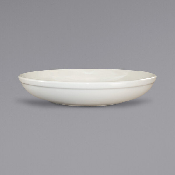 a white bowl on a gray background