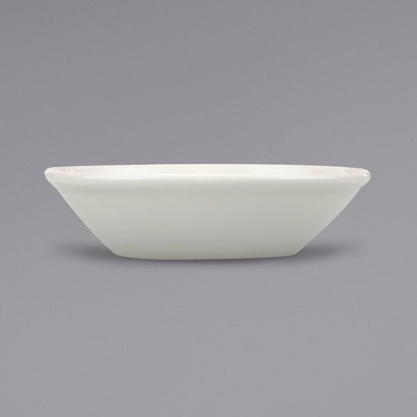 A close up of a International Tableware Roma Ivory Stoneware Bowl.