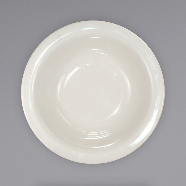A white International Tableware Roma stoneware bowl.