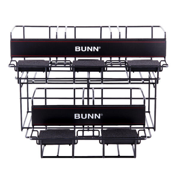 A black metal rack with white text that says "Bunn UNIV-5 APR" on it.