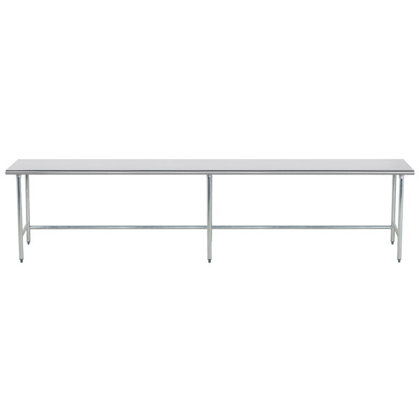 An Advance Tabco stainless steel work table with an open base and metal legs.