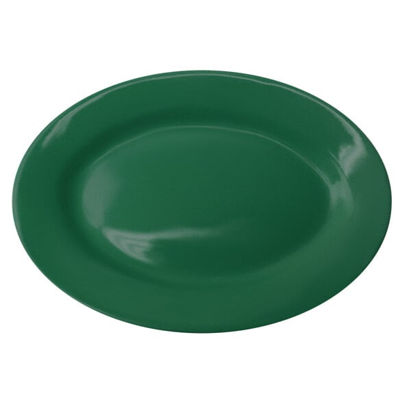 A green oval platter with a white background.