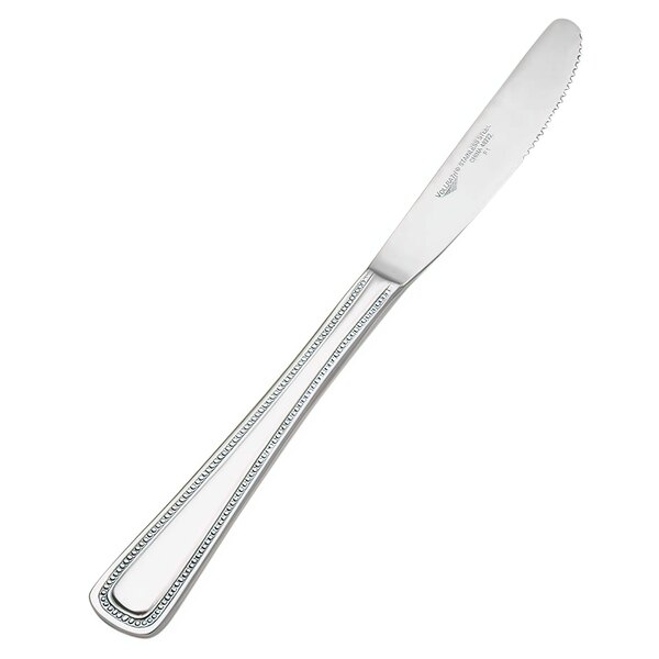 A Vollrath stainless steel dinner knife with a brocade handle.