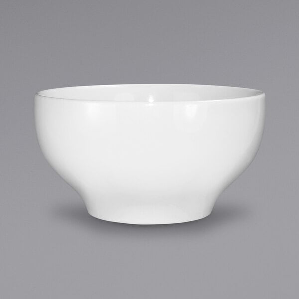 a white bowl on a gray background