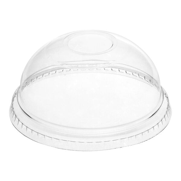 A clear plastic dome lid with a hole in it.