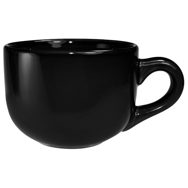 a black coffee cup with a handle
