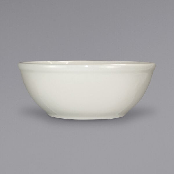 a white bowl on a gray background