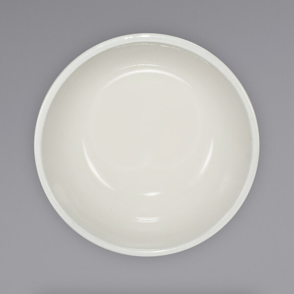 A white stoneware nappie bowl with a rolled edge.