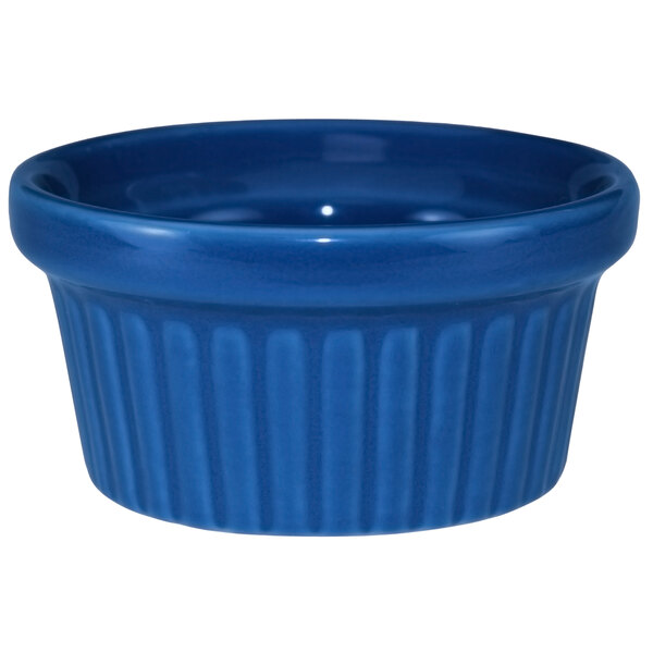 A light blue stoneware fluted ramekin.