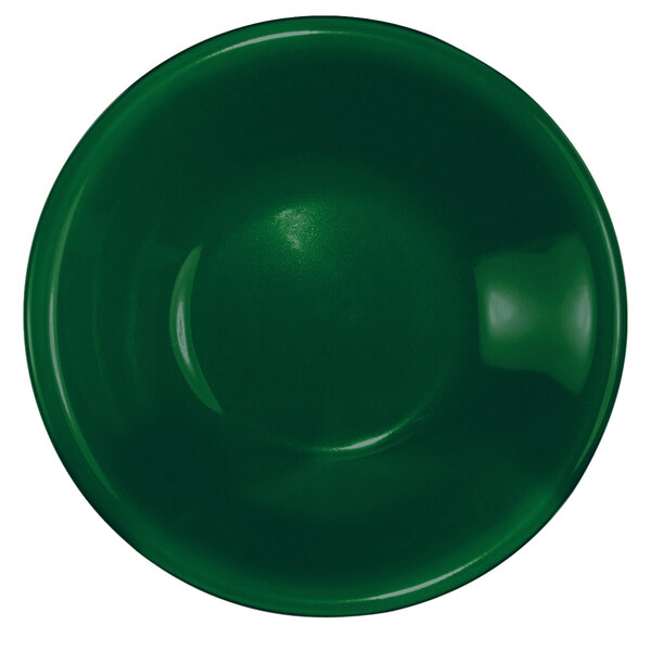 A green stoneware bowl.