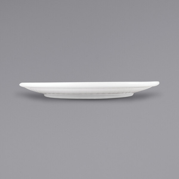 A white porcelain plate with a narrow rim.