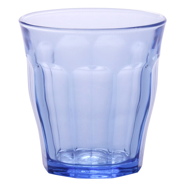 A Duralex Picardie marine blue glass tumbler with a small rim.