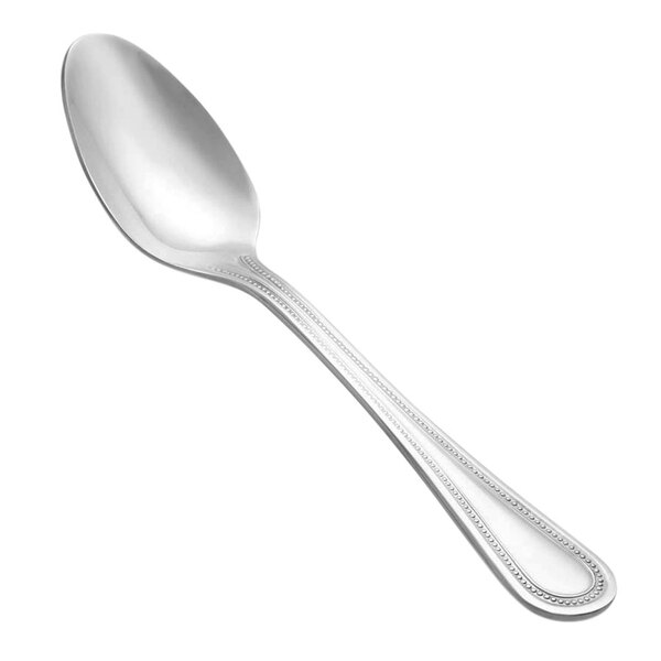 a silver spoon on a white background