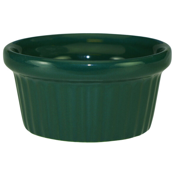 A green fluted stoneware ramekin.