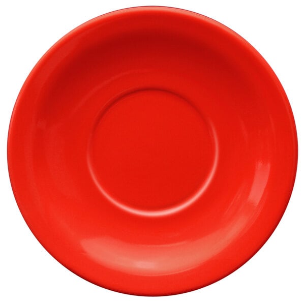 a red plate with a circle in the middle