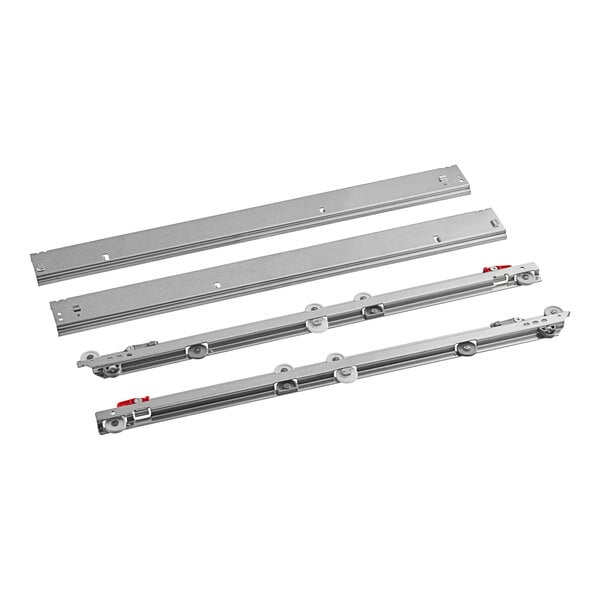 A group of metal parts including metal tracks and brackets with red handles.