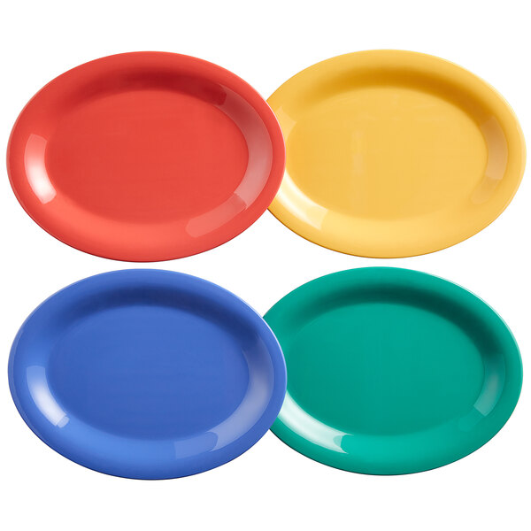 An assortment of oval melamine platters in four different colors on a white background.