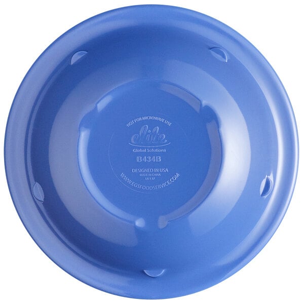 A blue melamine fruit dish with assorted colors inside.