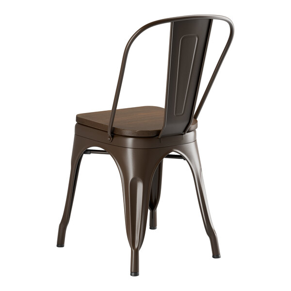 A brown metal Lancaster Table & Seating cafe chair with a wooden seat.