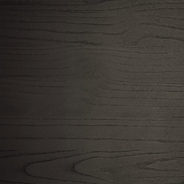 A Lancaster Table & Seating backless barstool with a black wood seat showing a grainy pattern and some scratches.