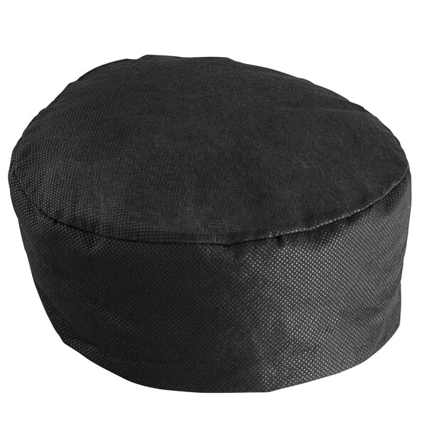 A black round AmerCare Royal beanie chef cap with a black brim.