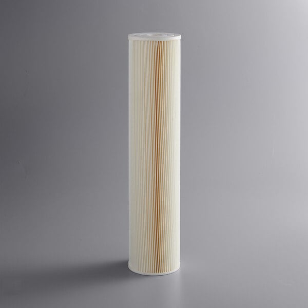 A close-up of a white and beige paper Everpure prefilter cartridge.