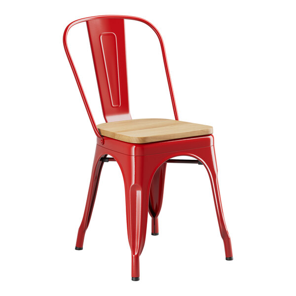 A Lancaster Table & Seating red metal cafe chair with a natural wood seat.