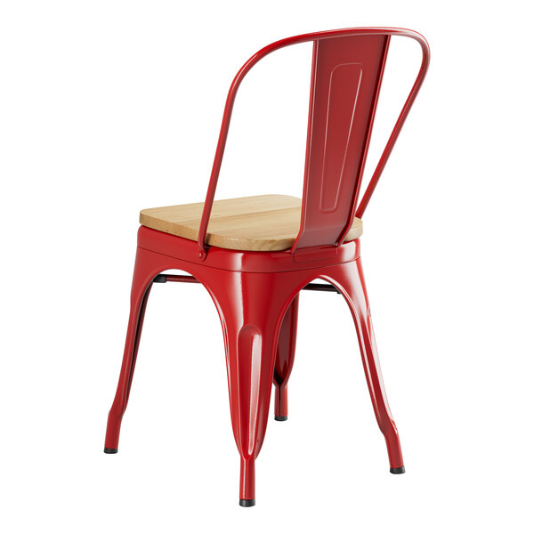 A Lancaster Table & Seating red metal indoor cafe chair with natural wood seat.
