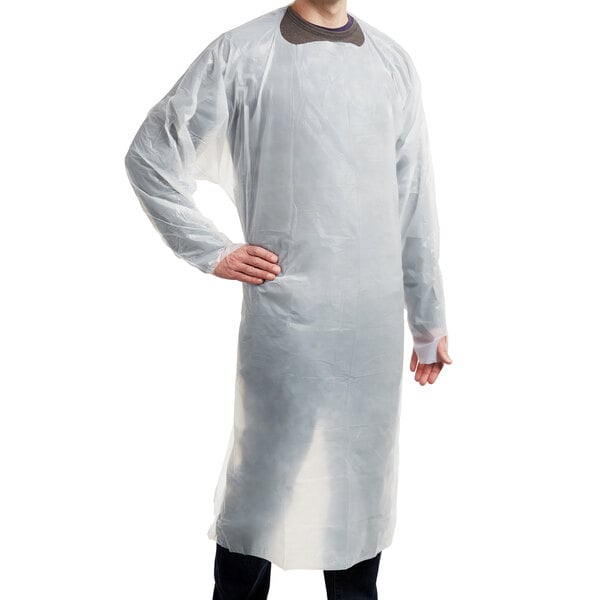 A man wearing a white plastic gown.