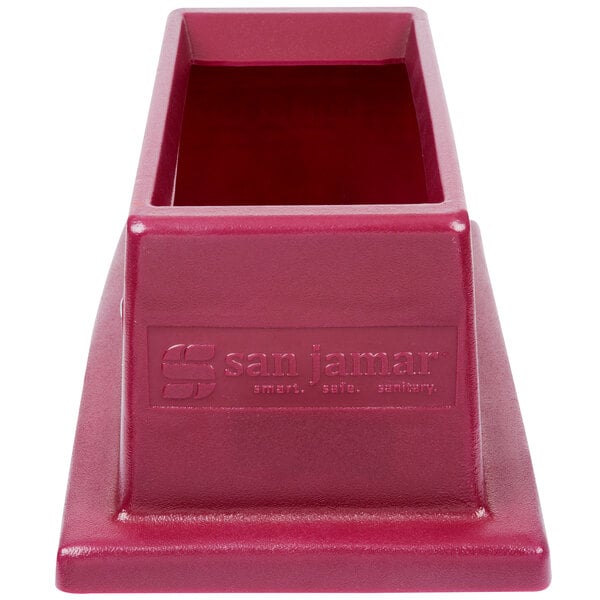 A red rectangular San Jamar flatware retriever lid with a rectangular bottom and a small hole in it.