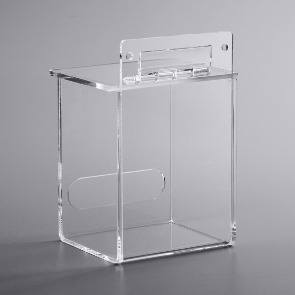 A clear plastic box with a clear lid and a hole.