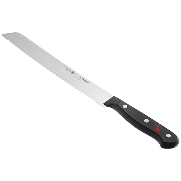 A Wusthof Gourmet bread knife with a black handle.