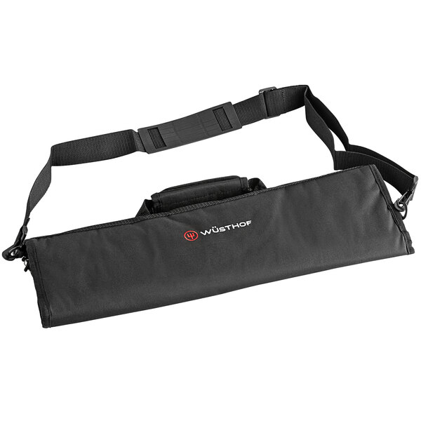 A black Wusthof knife roll with a strap and red logo.