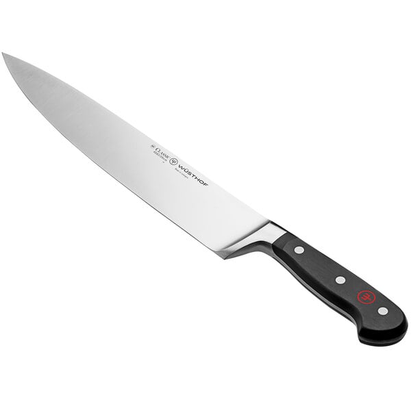 A Wusthof Classic chef's knife with a black handle.