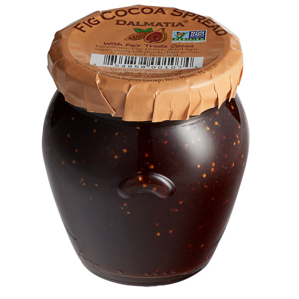 A jar of Dalmatia Fig Cocoa Spread with a white label.