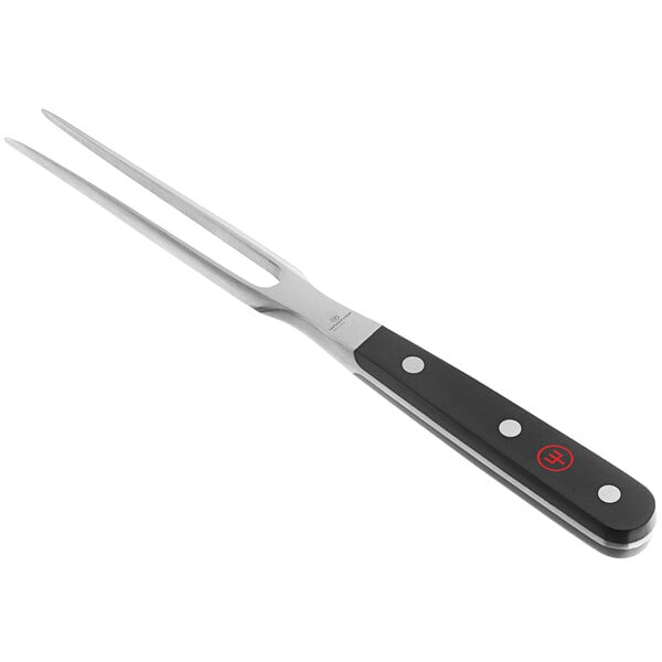 A Wusthof Classic Pot Fork with a black handle and red logo.