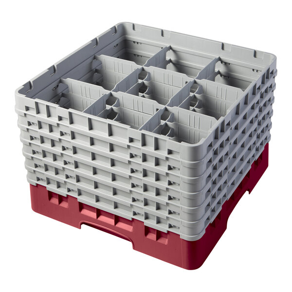 A red and gray plastic Cambro rack with compartments and extenders.